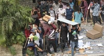 Students are seen taking away stuffs of Mahbubur Rahman Mollah College after carrying out attacks at the college premises. They were asked to remain calm - Photo collected