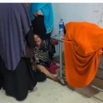 আরিফের মরদেহের পাশে স্বজনদের আহাজারি, ছবি - সংগৃহীত।